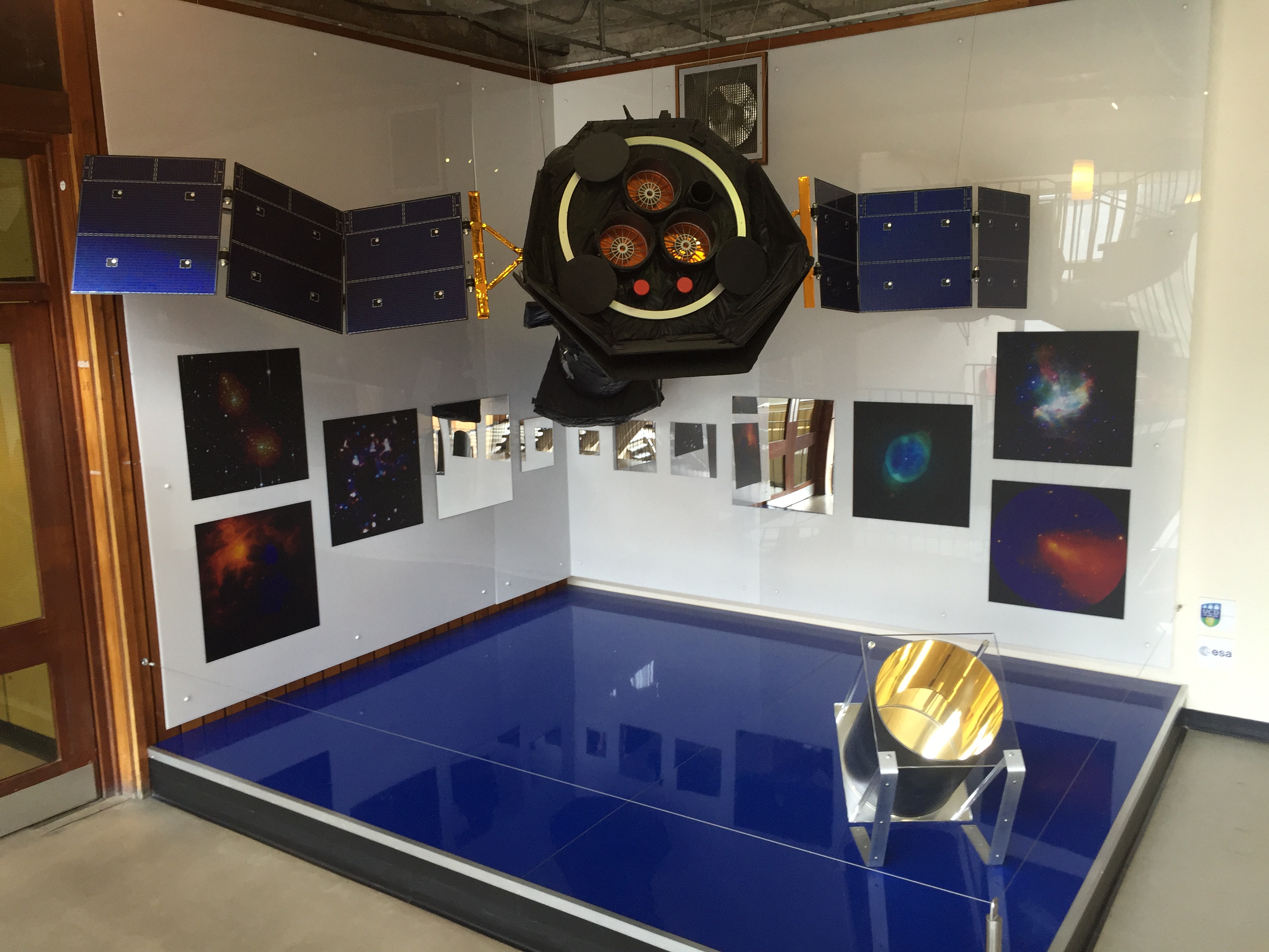 Physics internship - The second floor of the UCD Physics Building has a scale model of XMM Newton, a European Space Agency satellite. I pass by this on my way to class each morning!